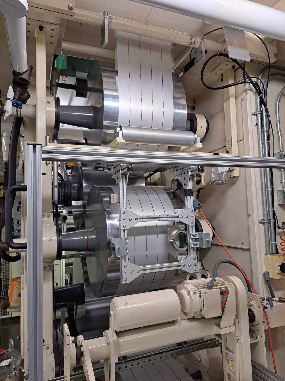 Roll-to-roll film handling and winding equipment